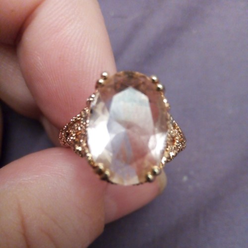 Sparkling pink gem possibly - gem,