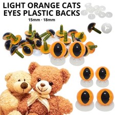 LIGHT ORANGE CATS EYES PLASTIC