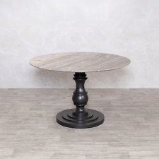 ROUND TRAVERTINE TOP TABLE ON