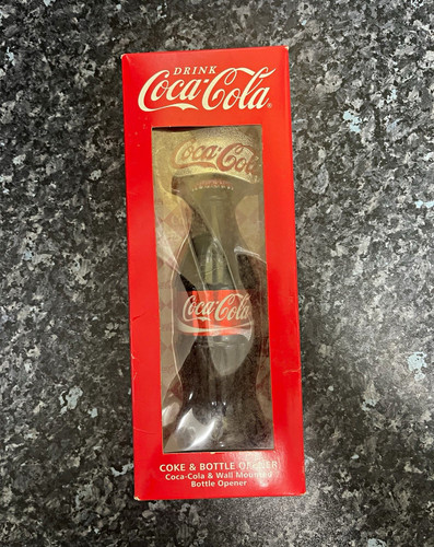 Coca cola ice - cold", wall