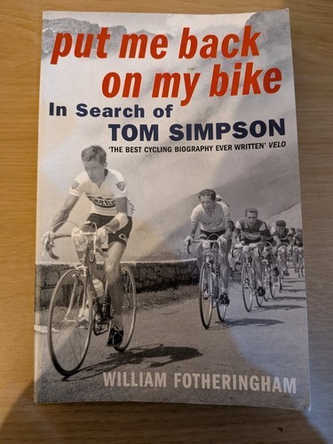 Put back bike in - back, on