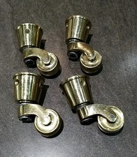 Heavy Duty brass castor cups and wheels x 4 (Cups 3 x 3 cm) (wheels 3cm H6cm)