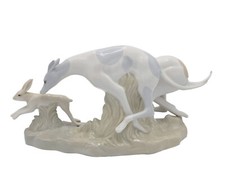 VINTAGE PORCELAIN FIGURINE