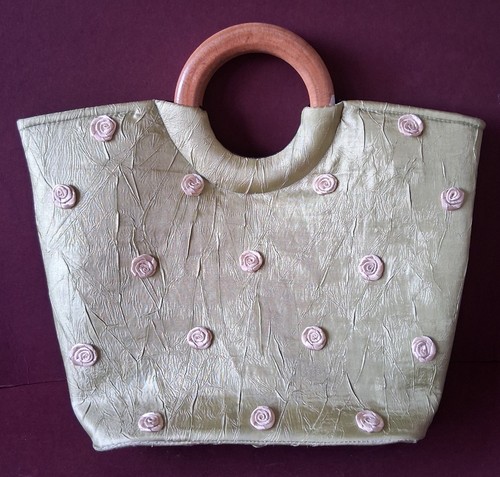 Green silk bag with round