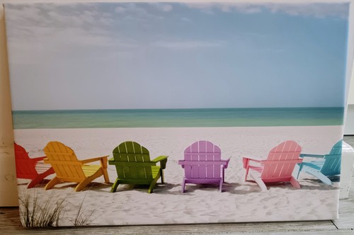 Multicoloured deckchairs a - on,