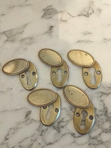 Old vintage brass escutcheon - old,