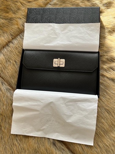New prada black leather clutch - new,
