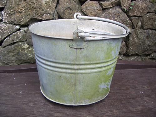 Old galvanized metal mop - galvanized,