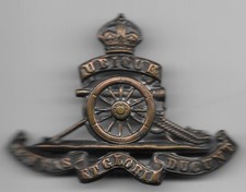 WW1 British Military Cap Badge - Royal Artillery Ubique - with pin to reverse