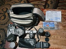 Bundle Olympus OM30 Vintage Film Camera, 2 zoom lenses, flash, case, damaged