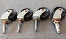 4 RECLAIMED  METAL CASTORS,  VGC.
