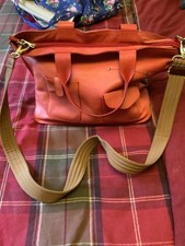 Itallian leather bag in orange,cross body or hand held.