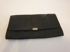 Warehouse black leather bag with silver stud close.