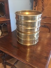 A SET OF FIVE VINTAGE BRASS