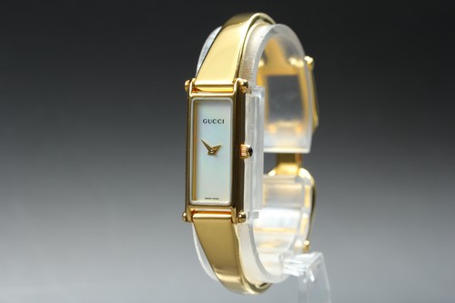 Near mint gucci 1500l - [near, gold