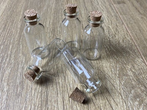 Small clear glass bottles - glass,