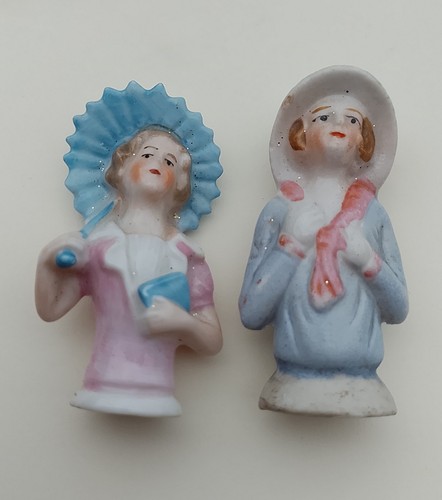 Pair antique porcelain - of, pin