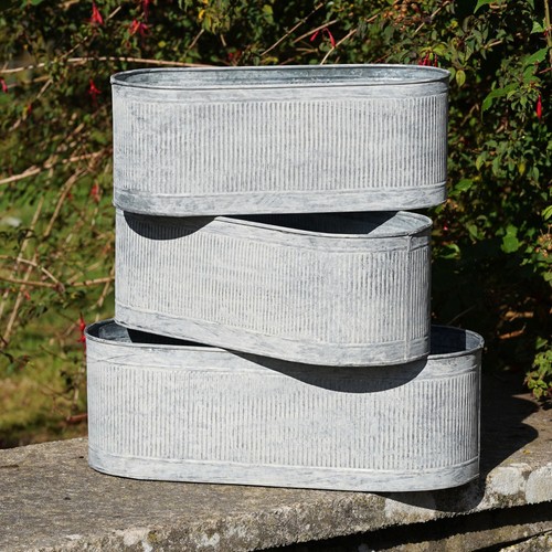 Large ribbed metal planters - ribbed,