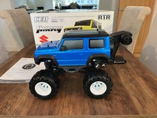 FMS 1:12 CEN Racing RC Suzuki Jimny  RTR in the rare metallic blue