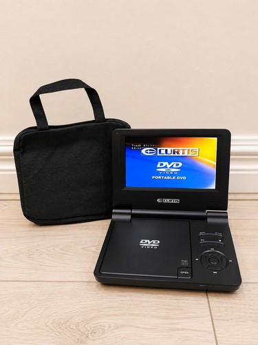 Curtis portable dvd player - curtis, 7"