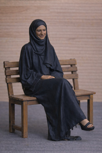 W37 seated muslim - w37, in