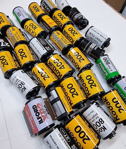 Empty 35mm film canisters - empty,