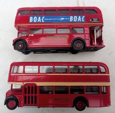 Two EFE 1:76 scale red buses
