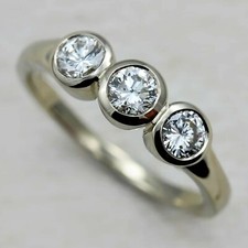 Bezel Set Round Cut Moissanite