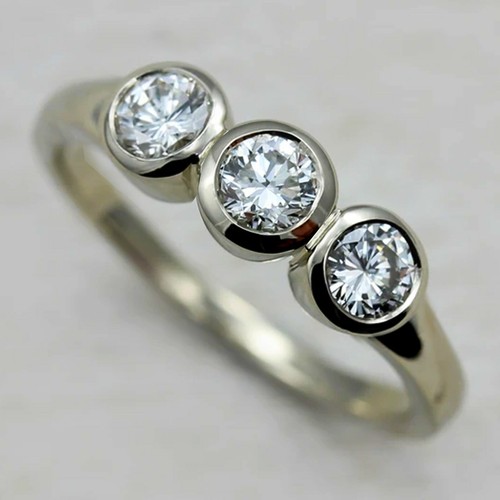 Bezel set round cut moissanite - set,