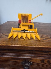 BRITAINS COMBINE HARVESTER /