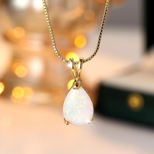 9ct yellow gold - gold, blue