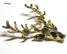 GOLD PLATED BROOCH OF A STAG'S HEAD WITH ANTLERS 52x52mms.................sm0325