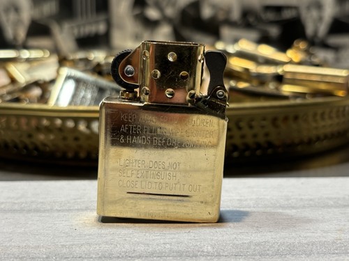 Zippo lighter new - new, brass