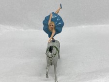 Circus Equestrian Balancing On