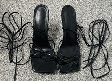 Amazon Black Patent Tie Leg