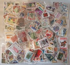 70+ PACKETS OF WORLD STAMPS -