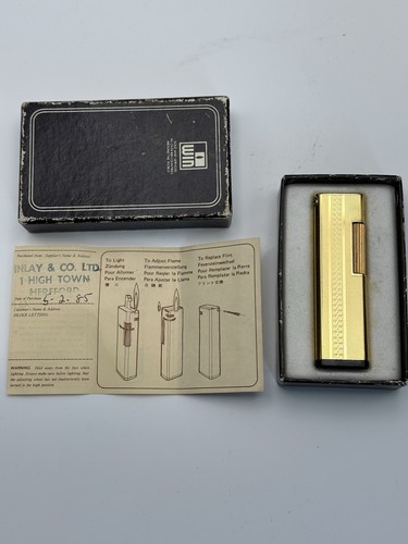 Vintage win japan gold tone - win,