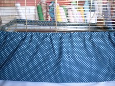 Dark green polka dot bird cage