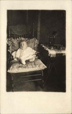Baby in Rocking Chair OLD