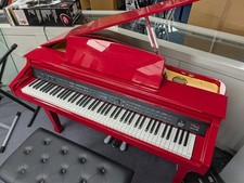 Orla 120 Digital Grand Piano in stunning red finish