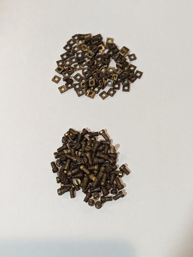 100 meccano part brass - 100,