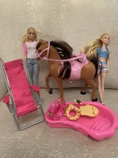 2 Barbie Dolls with Horse and