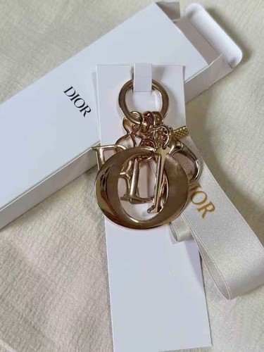 Dior charm gold - lucky, logo