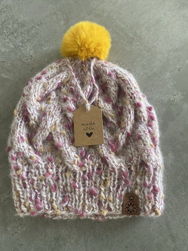 Hand knitted cable knit bobble - hand,