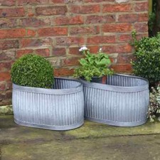 PAIR OF OVAL DOLLY TUB GARDEN