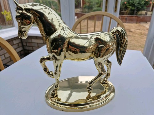 Brass horse ornament stand - on,