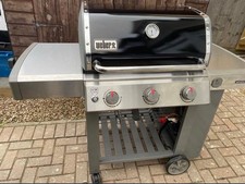 Weber Genesis II E-310 3-Burner Gas Barbecue with full cover. 