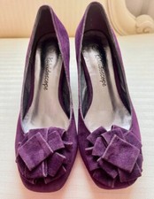 Purple faux suede rosette court shoes from  Kaleidoscope with 6cm heel size 5