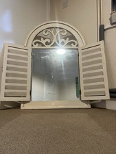 Mirror With Shutters