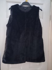 Ladies size 10 black faux fur